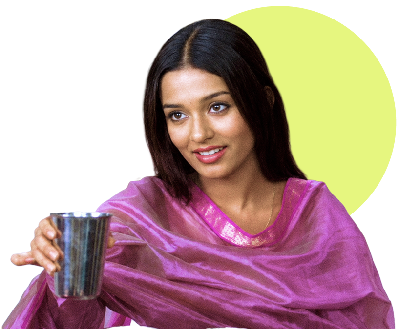 Woman holding a steel glass of water